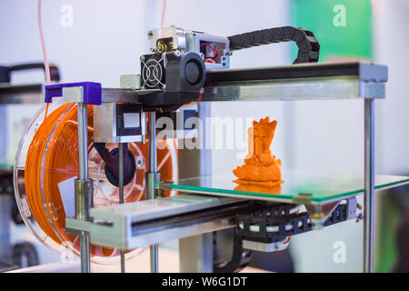Automatic three dimensional 3D printer machine printing plastic model Stock Photo
