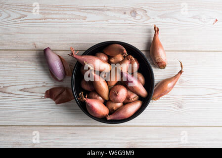 Premium Photo  Red shallots isolated on white background