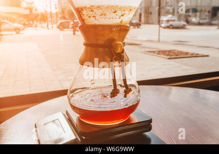 Alternating filter manual brewing of coffee. One of the step of making coffee Stock Photo