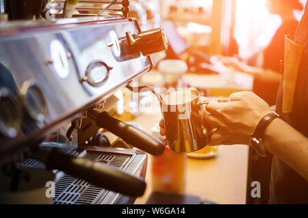 Close up of barista preparing fresh latte Stock Photo