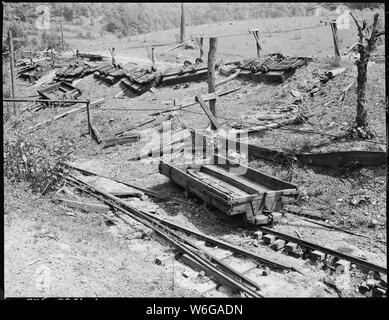 Debris around abandoned tipple of mine which exploded last December. Kentucky Straight Creek Coal Company, Belva Mine, abandoned after explosion [in] Dec. 1945, Four Mile, Bell County, Kentucky. Stock Photo