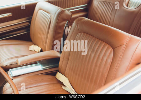 Old leather vintage car seat detail. interior of the old car. Stock Photo