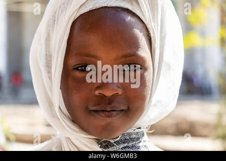 Portrait of a young Ethiopian girl at the Church of Saint George during Timkat, the Orthodox Tewahedo celebration of Epiphany, celebrated on Januar... Stock Photo