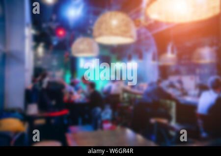 Restaurant on a blurred background. Beautiful bokeh. Party at the night concept Stock Photo