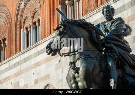 The big bronze equestrian statue beside of the Palazzo Gotico. The knight is represented Ranuccio Farnese, the Duke of Parma and Piacenza. Stock Photo