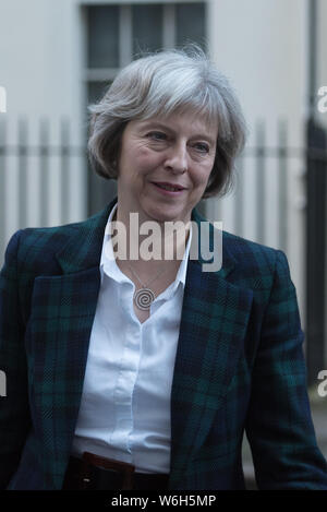 Downing Street, London, UK. 8th December, 2015.  Home Secretary Theresa May leaves Downing Street this afternoon. Stock Photo