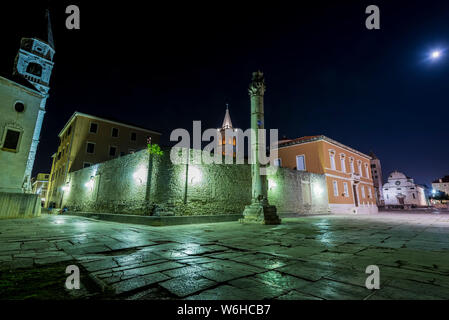 The Pillar of Shame at the Roman Forum at night; Zadar, Croatia Stock Photo