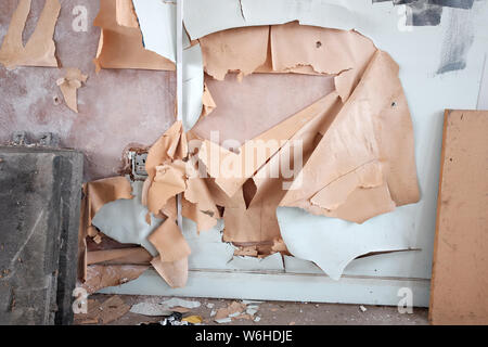 July 2019 - Paint peeling off the walls of an old building Stock Photo
