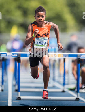 Greensboro, North Carolina, USA. 01st Aug, 2019. August 1, 2019: Zacchaeus Brocks sets a national record winning the Boys 80 Meter Hurdles 11 years old division in the 2019 AAU Junior Olympic Games at BB&T Stadium in Greensboro, North Carolina. Brocks finished with a record time of 12.10 seconds. Prentice C. James/CSM Credit: Cal Sport Media/Alamy Live News Stock Photo