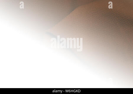 Brown fabric background with white glow , space for text Stock Photo