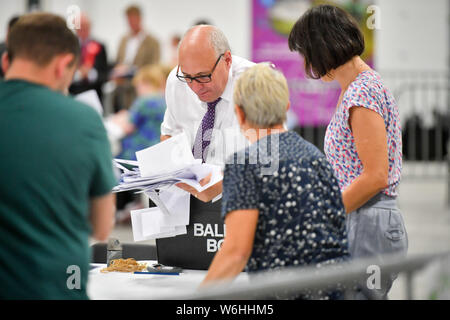 Votes are taken from a ballot box during the count of votes in the Brecon and Radnorshire by-election at the Royal Welsh Showground, Llanelwedd, Builth Wells.