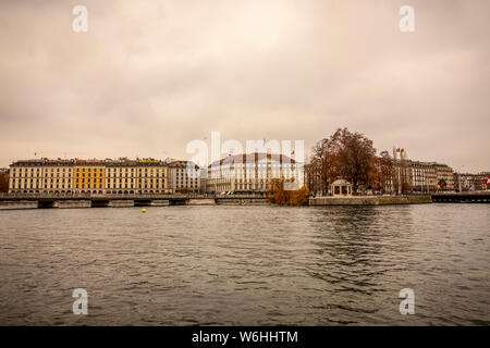 Colourful residential buildings along the water of Lake Geneva; Geneva, Geneva, Switzerland Stock Photo