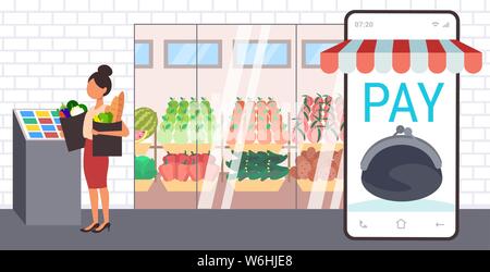 woman holding grocery bags housewife using smartphone mobile app for purchasing at self-service cash register online shopping concept flat full length Stock Vector