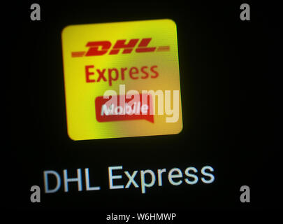 DHL Express application icon on computer display. DHL (Dalsey, Hillblom ...
