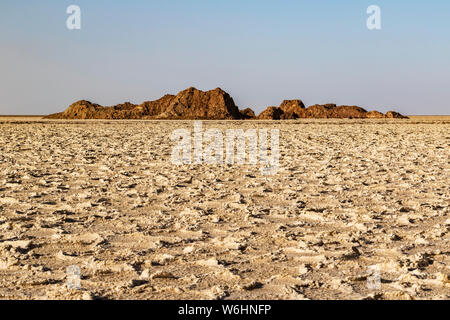 Rocky outcrop in the salt flats of Lake Karum (Lake Assale), Danakil Depression; Afar Region, Ethiopia Stock Photo