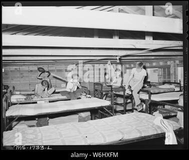 Interior of cottage for campers. Capacity of cottage is 22 bunks, using double deckers. Ordinarily about 18 to 20 are in one cottage. Koppers Recreation Camps, Inc. Camp Thomas E. Lightfoot, Hinton, Summers County, West Virginia. Stock Photo