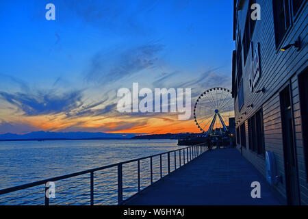 Twilight on Puget Sound in Seattle with Ferris Wheel Stock Photo