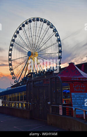 Twilight on Puget Sound in Seattle with Ferris Wheel Stock Photo