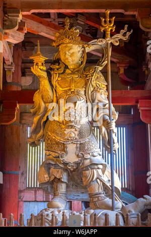 Nara, Japan - October 29 2018:  Bishamonten is one of the Japanese Seven Gods of Fortune inside the Daibutsuden great hall at Todaiji Temple Stock Photo