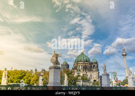 BERLIN, GERMANY - July 28, 2018: Overview of three important landmarks of the Berlin history: the Schloss brigde and its imperial statues, the Stock Photo