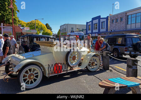 Motueka, Tasman/New Zealand - February 17, 2013: People admiring a vintage car at a show in Motueka High Street in front of the museum. Stock Photo