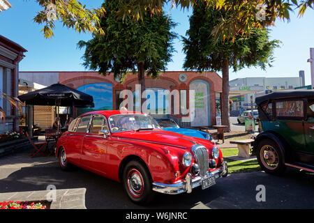 Motueka, Tasman/New Zealand - February 17, 2013: Red Jaguar at a vintage car show in Motueka High Street in front of the museum. Stock Photo