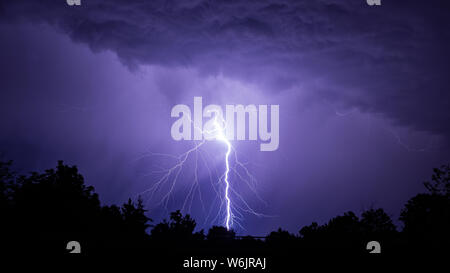 Cloud to ground lightning strike from severe weather Colorado, USA Stock Photo
