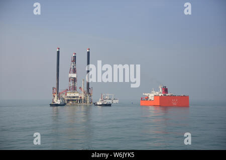 Aerial view of the two offshore oil drilling platforms 'Shengli 4' and 'New Shengli 1' of Sinopec Group to help Nigeria exploit oil and gas at a port Stock Photo