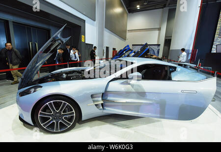 --FILE--Visitors look at an Aston Martin One-77 displayed at the 2017 China Hangzhou International Automobile Expo in Hangzhou city, east China's Zhej Stock Photo