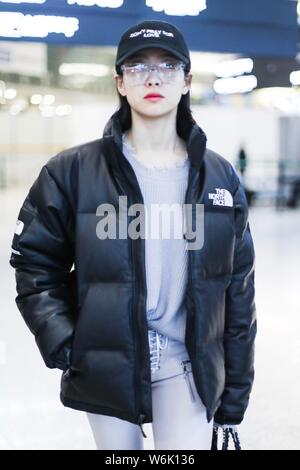 Chinese singer and actress Victoria Song or Song Qian is pictured at an airport in Shanghai, China, 7 February 2018. Stock Photo