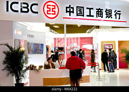 --FILE--People visit the stand of ICBC (Industrial and Commercial Bank of China) during an exhibition in Beijing, China, 27 January 2018.   Community Stock Photo