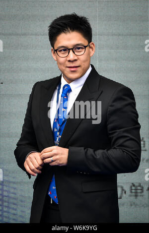 Kenneth Fok Kai-kong, right, eldest son of Hong Kong tycoon Timothy Fok Tsun-Ting, is pictured as the Volvo Ocean Race fleet arrived in Guangzhou for Stock Photo