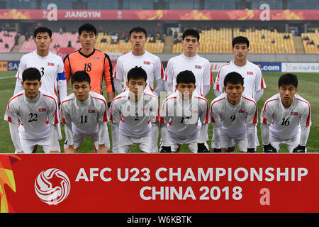 Players of the starting line-up of North Korea pose before competing against Japan in their Group B match during the 2018 AFC U-23 Championship in Jia Stock Photo