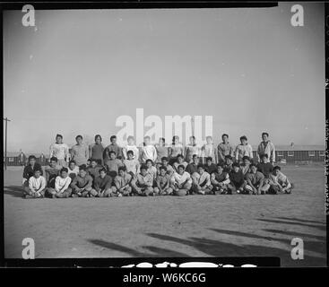 Rohwer Relocation Center, McGehee, Arkansas. A football squad at the Rohwer Center. Stock Photo