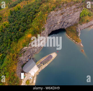 View of a heart-shape pond which was once a stone quarry, abandoned three years ago, at Shapingba District in Chongqing, China, 8 January 2018.   Bene Stock Photo