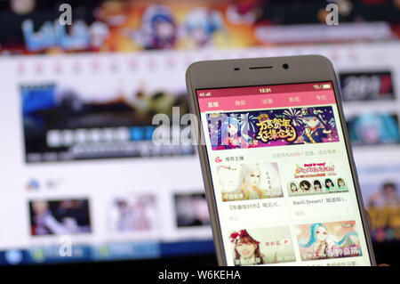 FILE A Chinese mobile user uses the mobile app Bilibili a leading