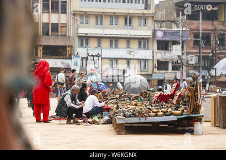 Some street vendors are selling souvenirs in Kathmandu Durbar Square. Stock Photo