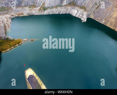 View of a heart-shape pond which was once a stone quarry, abandoned three years ago, at Shapingba District in Chongqing, China, 8 January 2018.   Bene Stock Photo