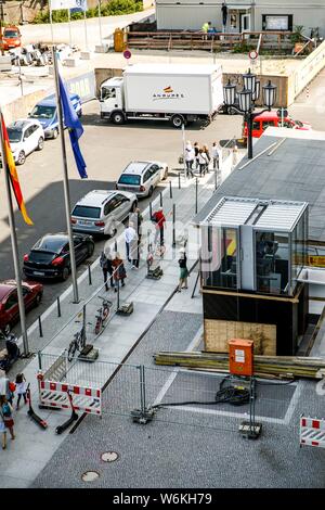 Berlin, Germany. 01st Aug, 2019. Cars are standing in front of the elevator at the construction site of the future underground line U5 at the U5 info station in front of the Red City Hall. Credit: Carsten Koall/dpa/Alamy Live News Stock Photo