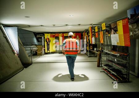 Berlin, Germany. 01st Aug, 2019. A construction worker walks on a construction site of the subway line U5 at the U5 info station in front of the Red Town Hall. Credit: Carsten Koall/dpa/Alamy Live News Stock Photo