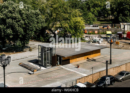 Berlin, Germany. 01st Aug, 2019. Cars are standing in front of the elevator at the construction site of the future underground line U5 at the U5 info station in front of the Red City Hall. Credit: Carsten Koall/dpa/Alamy Live News Stock Photo