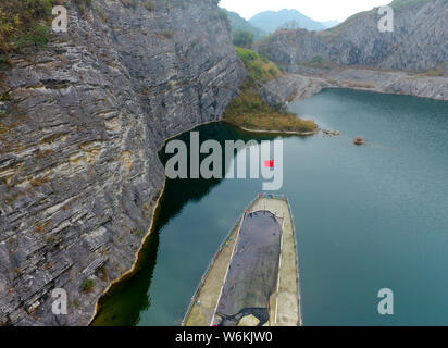 View of a heart-shape pond which was once a stone quarry, abandoned three years ago, at Shapingba District in Chongqing, China, 8 January 2018.   Bene Stock Photo