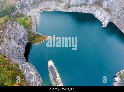 View of a heart-shape pond which was once a stone quarry, abandoned three years ago, at Shapingba District in Chongqing, China, 8 January 2018.   Bene Stock Photo