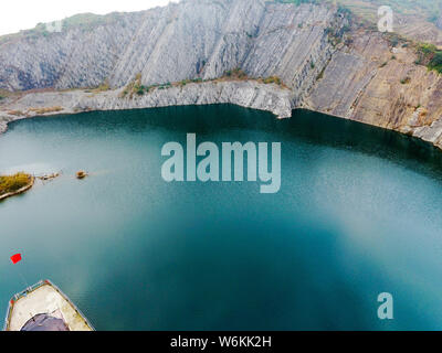 View of a heart-shape pond which was once a stone quarry, abandoned three years ago, at Shapingba District in Chongqing, China, 8 January 2018.   Bene Stock Photo