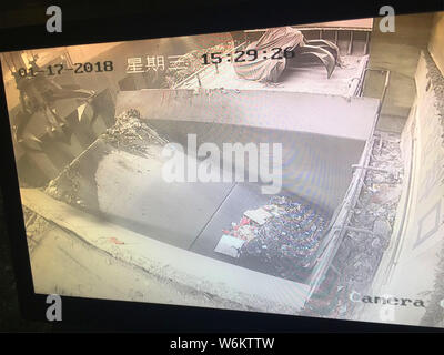 2,333 cartons of counterfeit Zhonghua brand cigarettes are being destroyed in an incinerator during a winter operation in Zhenjiang city, east China's Stock Photo