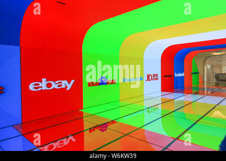--FILE--Logos of ebay, Baidu, Tencent, JD.com, Amazon.com and Facebook are pictured at the headquarters of Chinese online retailer JD.com in Beijing, Stock Photo