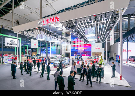 --FILE--People visit the stand of Dongfeng Motors during the 15th China (Guangzhou) International Automobile Exhibition, also known as Auto Guangzhou Stock Photo