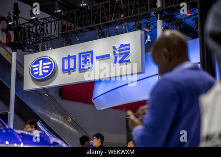 --FILE--People visit the stand of FAW during the 15th China (Guangzhou) International Automobile Exhibition, also known as Auto Guangzhou 2017, in Gua Stock Photo