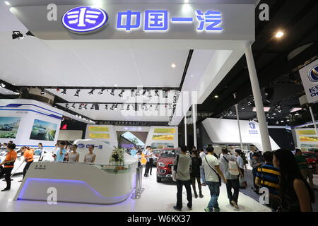 --FILE--People visit the stand of FAW during the 13th China (Guangzhou) International Automobile Exhibition, also known as Auto Guangzhou 2015, in Gua Stock Photo