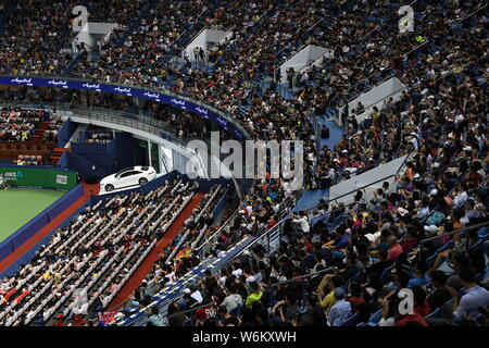 FILE Spectators watch a men s singles match during the Shanghai